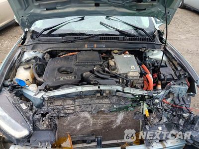 Zdjęcie 11 z 12 samochodu: 2013 FORD FUSION SE PHEV VIN:3FA6P0PU3DR332461 - miniatura