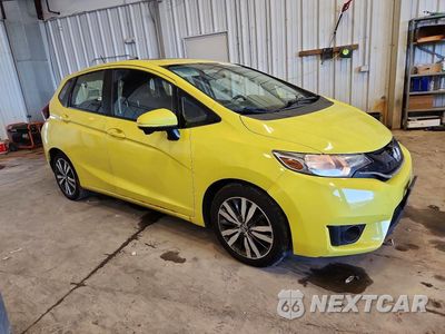 Czwarte zdjęcie samochodu z boku: 2016 HONDA FIT EX VIN:JHMGK5H73GX041424 - miniatura