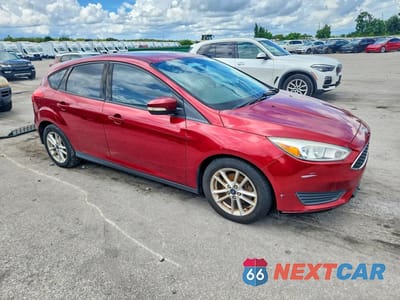 Czwarte zdjęcie samochodu z boku: 2016 FORD FOCUS SE VIN:1FADP3K24GL209673 - miniatura
