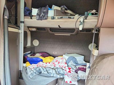 Zdjęcie 10 z 14 samochodu: 2016 VOLVO VNL SEMI TRUCK VIN:4V4NC9EH9GN929363 - miniatura