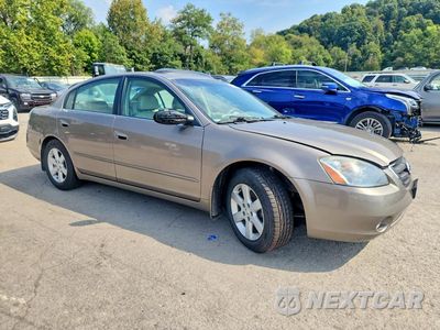 Czwarte zdjęcie samochodu z boku: 2003 NISSAN ALTIMA 2.5 S VIN:1N4AL11E93C288007 - miniatura
