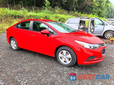 Czwarte zdjęcie samochodu z boku: 2017 CHEVROLET CRUZE LS VIN:1G1BC5SM4H7130419 - miniatura