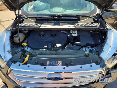 Zdjęcie 11 z 12 samochodu: 2017 FORD ESCAPE TITANIUM VIN:1FMCU9J90HUA15259 - miniatura