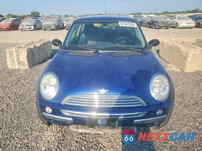 Piąte zdjęcie samochodu w środku: 2003 MINI COOPER VIN:WMWRC33483TE15553 - miniatura