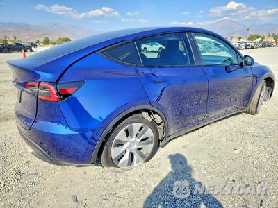 Trzecie zdjęcie samochodu z tyłu: 2023 TESLA MODEL Y VIN:7SAYGAEE4PF615495 - miniatura