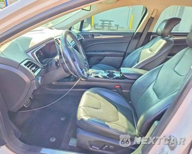 Zdjęcie 7 z 12 samochodu: 2014 FORD FUSION TITANIUM VIN:3FA6P0K92ER389688 - miniatura