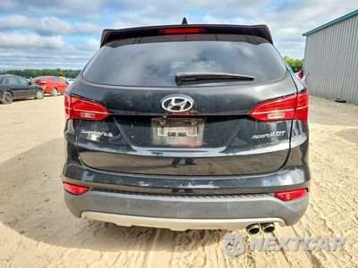 Zdjęcie 6 z 13 samochodu: 2014 HYUNDAI SANTA FE SPORT 2.0T VIN:5XYZW3LAXEG231789 - miniatura