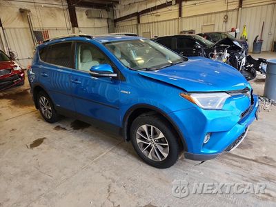 Czwarte zdjęcie samochodu z boku: 2018 TOYOTA RAV4 HYBRID XLE VIN:JTMRJREVXJD155114 - miniatura