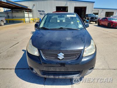 Piąte zdjęcie samochodu w środku: 2011 SUZUKI SX4 LE VIN:JS2YC5A21B6303012 - miniatura