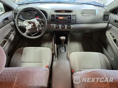 Zdjęcie 8 z 14 samochodu: 2002 TOYOTA CAMRY LE VIN:4T1BE32K12U019965 - miniatura