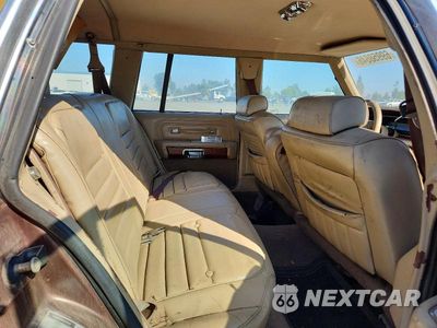 Zdjęcie 10 z 12 samochodu: 1991 FORD CROWN VICTORIA COUNTRY SQUIRE LX VIN:2FACP79FXMX149215 - miniatura