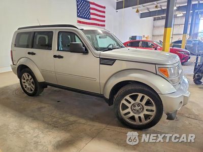 Czwarte zdjęcie samochodu z boku: 2011 DODGE NITRO HEAT VIN:1D4PU4GK1BW517585 - miniatura