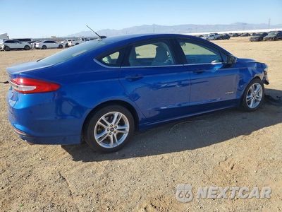Trzecie zdjęcie samochodu z tyłu: 2018 FORD FUSION S HYBRID VIN:3FA6P0UU3JR122569 - miniatura
