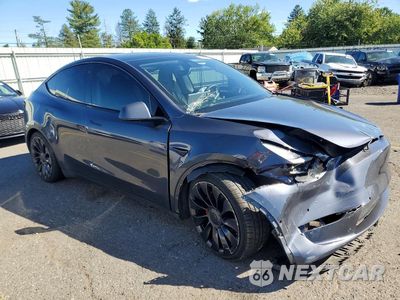 Czwarte zdjęcie samochodu z boku: 2022 TESLA MODEL Y VIN:7SAYGDEF2NF396348 - miniatura