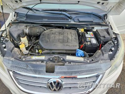Zdjęcie 12 z 13 samochodu: 2011 VOLKSWAGEN ROUTAN SE VIN:2V4RW3DG5BR636488 - miniatura