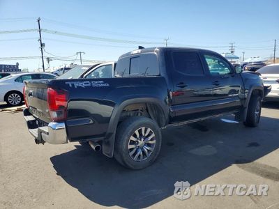 Trzecie zdjęcie samochodu z tyłu: 2018 TOYOTA TACOMA TRD OFF-ROAD VIN:3TMAZ5CN4JM066175 - miniatura