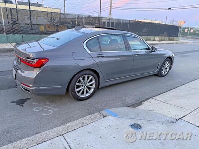 Czwarte zdjęcie samochodu z boku: 2022 BMW 740 XI VIN:WBA7T4C07NCJ53468 - miniatura