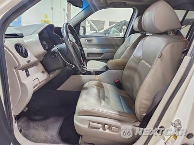 Zdjęcie 7 z 13 samochodu: 2011 HONDA PILOT EXL VIN:5FNYF4H56BB049961 - miniatura