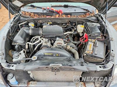 Zdjęcie 11 z 12 samochodu: 2006 DODGE DAKOTA QUAD SLT VIN:1D7HW48N16S630458 - miniatura