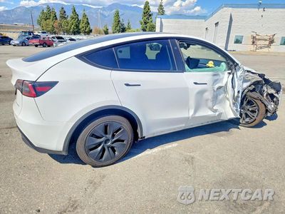 Trzecie zdjęcie samochodu z tyłu: 2024 TESLA MODEL Y VIN:7SAYGDEE8RF114582 - miniatura