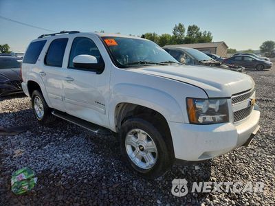 Czwarte zdjęcie samochodu z boku: 2010 CHEVROLET TAHOE K1500 LT VIN:1GNUKBE07AR145234 - miniatura