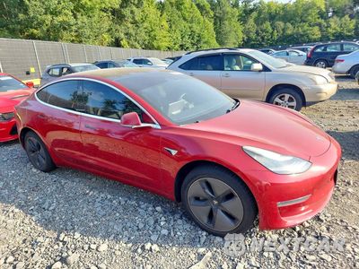 Czwarte zdjęcie samochodu z boku: 2018 TESLA MODEL 3 VIN:5YJ3E1EA6JF153894 - miniatura