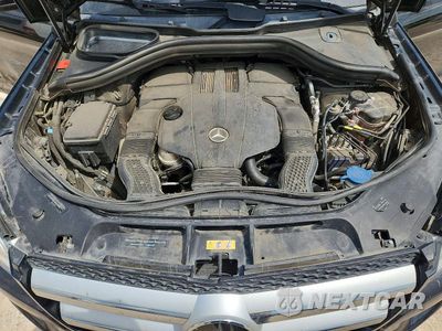 Zdjęcie 12 z 13 samochodu: 2016 MERCEDES-BENZ GL 450 4MATIC VIN:4JGDF6EE4GA694442 - miniatura