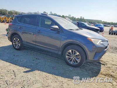 Czwarte zdjęcie samochodu z boku: 2018 TOYOTA RAV4 HYBRID LE VIN:JTMRJREV1JD190317 - miniatura