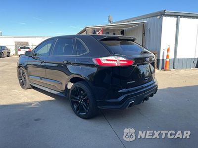Trzecie zdjęcie samochodu z tyłu: 2019 FORD EDGE ST VIN:2FMPK4AP2KBB95737 - miniatura