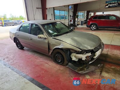 Czwarte zdjęcie samochodu z boku: 1999 TOYOTA CAMRY LE VIN:JT2BG22K0X0373427 - miniatura