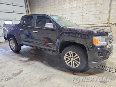 Czwarte zdjęcie samochodu z boku: 2015 GMC CANYON SLT VIN:1GTG6CE39F1251989 - miniatura