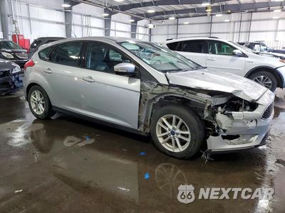 Czwarte zdjęcie samochodu z boku: 2016 FORD FOCUS SE VIN:1FADP3K27GL391756 - miniatura
