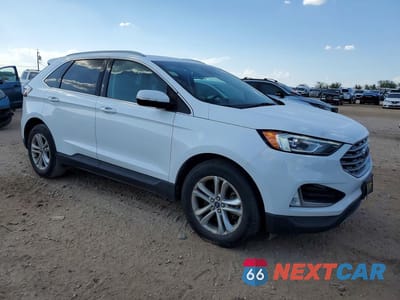 Czwarte zdjęcie samochodu z boku: 2020 FORD EDGE SEL VIN:2FMPK4J91LBA77617 - miniatura