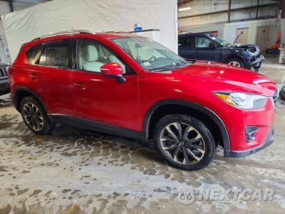 Czwarte zdjęcie samochodu z boku: 2016 MAZDA CX-5 GT VIN:JM3KE4DY3G0839806 - miniatura