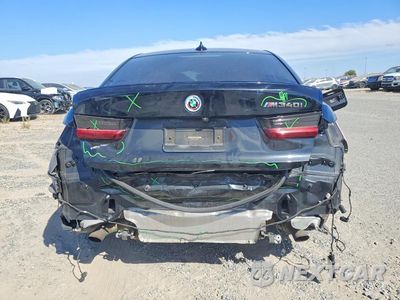 Zdjęcie 6 z 13 samochodu: 2022 BMW M340I VIN:3MW5U7J04N8C34508 - miniatura