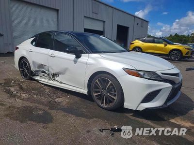 Czwarte zdjęcie samochodu z boku: 2019 TOYOTA CAMRY XSE VIN:4T1B61HK4KU219084 - miniatura