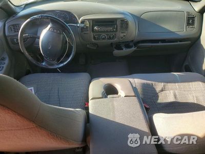 Zdjęcie 8 z 12 samochodu: 2000 FORD F150 VIN:1FTRX07W1YKA80227 - miniatura