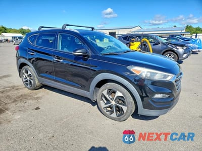 Czwarte zdjęcie samochodu z boku: 2016 HYUNDAI TUCSON LIMITED VIN:KM8J33A28GU162681 - miniatura