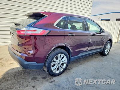 Trzecie zdjęcie samochodu z tyłu: 2023 FORD EDGE TITANIUM VIN:2FMPK4K93PBA37446 - miniatura