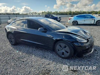 Czwarte zdjęcie samochodu z boku: 2022 TESLA MODEL 3 VIN:5YJ3E1EA2NF188857 - miniatura