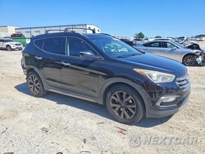 Czwarte zdjęcie samochodu z boku: 2018 HYUNDAI SANTA FE SPORT 2.0T ULTIMATE VIN:5NMZW4LA3JH069798 - miniatura