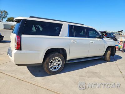 Trzecie zdjęcie samochodu z tyłu: 2015 GMC YUKON XL K1500 SLT VIN:1GKS2HKC7FR687995 - miniatura