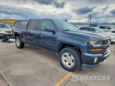 Czwarte zdjęcie samochodu z boku: 2017 CHEVROLET SILVERADO K1500 LT VIN:3GCUKREC9HG197289 - miniatura