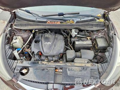 Zdjęcie 12 z 13 samochodu: 2014 HYUNDAI TUCSON LIMITED VIN:KM8JUCAG9EU844121 - miniatura