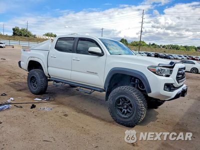 Czwarte zdjęcie samochodu z boku: 2016 TOYOTA TACOMA TRD OFF-ROAD VIN:3TMCZ5AN4GM030930 - miniatura