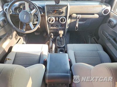 Zdjęcie 8 z 12 samochodu: 2009 JEEP WRANGLER UNLIMITED SAHARA VIN:1J4GA59149L760569 - miniatura