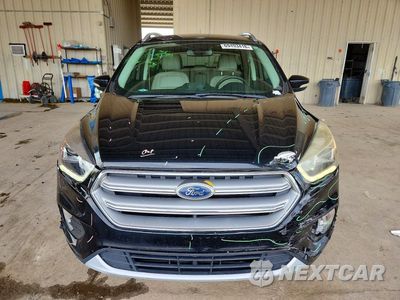 Piąte zdjęcie samochodu w środku: 2017 FORD ESCAPE TITANIUM VIN:1FMCU0JD1HUC73287 - miniatura