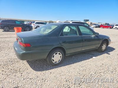Trzecie zdjęcie samochodu z tyłu: 1999 TOYOTA CAMRY CE VIN:4T1BG22KXXU869069 - miniatura