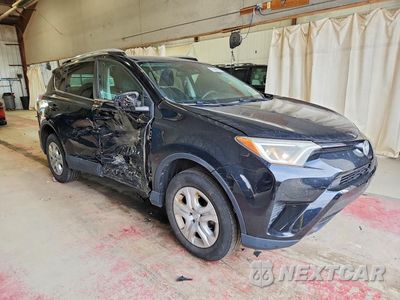Czwarte zdjęcie samochodu z boku: 2017 TOYOTA RAV4 LE VIN:2T3BFREV5HW582569 - miniatura