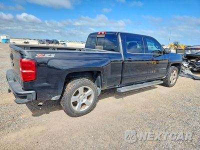 Trzecie zdjęcie samochodu z tyłu: 2017 CHEVROLET SILVERADO K1500 LT VIN:3GCUKREC8HG145264 - miniatura
